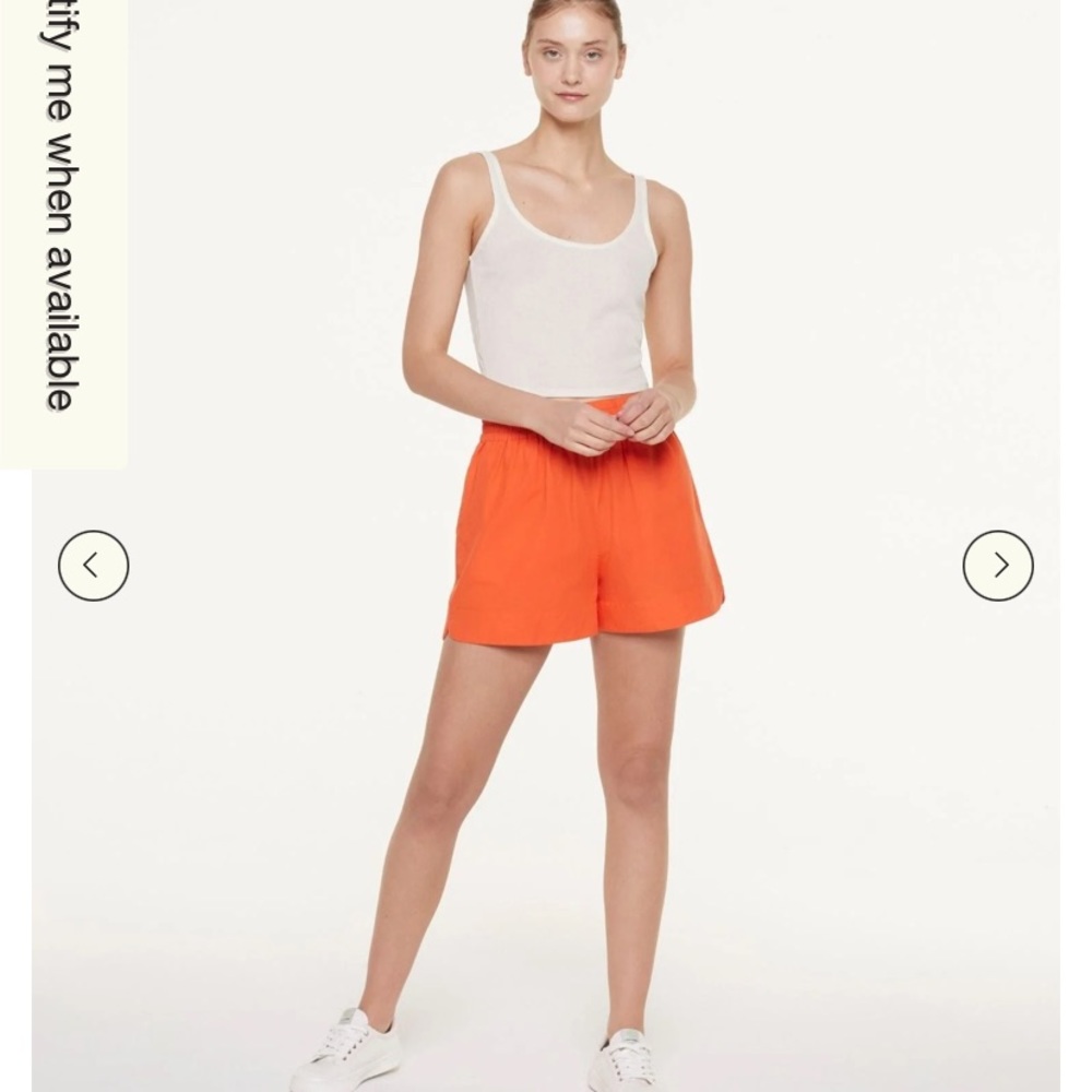 Orange pull on shorts with pockets